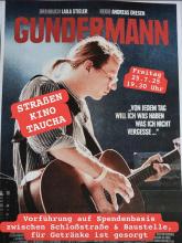 Filmplakat mit Gundermann an der Gitarre und Texthinweis zum Filmabend